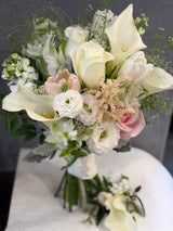 Reflower HK elegant bridal bouquet featuring white calla lilies and white roses with dusty miller, matched with a groom's boutonniere for a pure and noble wedding style.